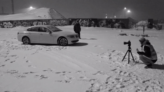 taking pictures of a car in the snow