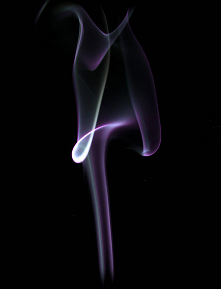 purple smoke on black background