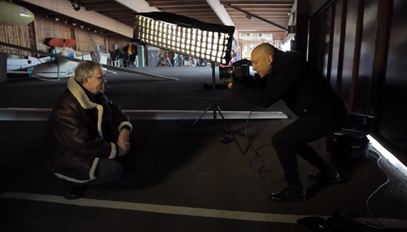 Andrea Belluso shooting a porttrait in a hangar