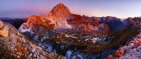 mountain landscape lit by rising sun