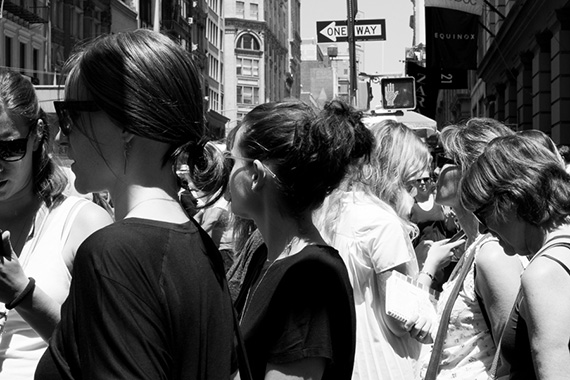 black and white street photo crowd nyc