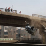 Photojournalism Image of the Day: Armored Vehicle Falls Off Overpass During Arab Spring