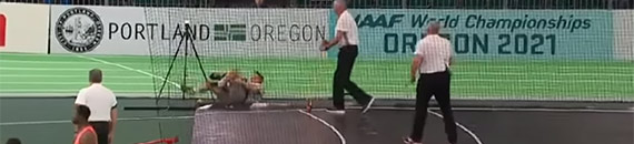 Sports Photographer Hit By a Stray Shot Put