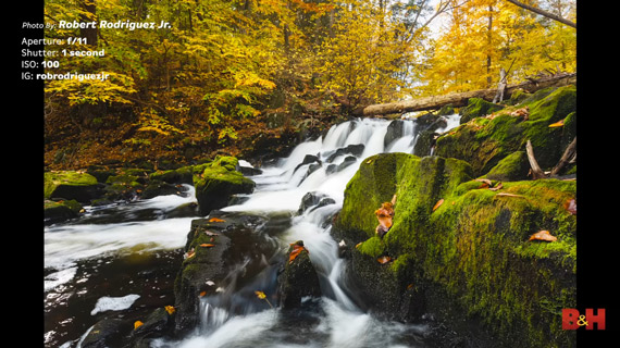 A long exposure image of a stream during autumn