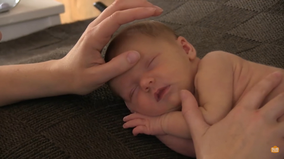 posing a newborn for photography