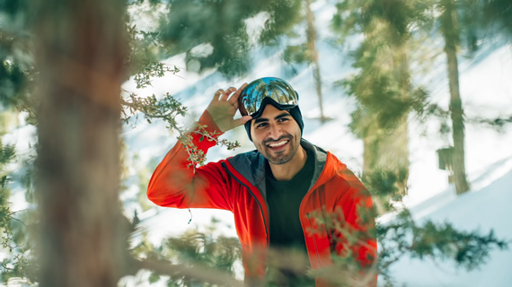 portrait shot through branches to add depth