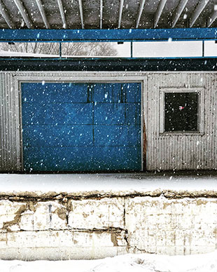 photo with colorful object in foreground during snow storm 